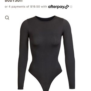 ESSENTIAL CREW NECK LONG SLEEVE BODYSUIT by Skims! Size s/m worn once! Black!
